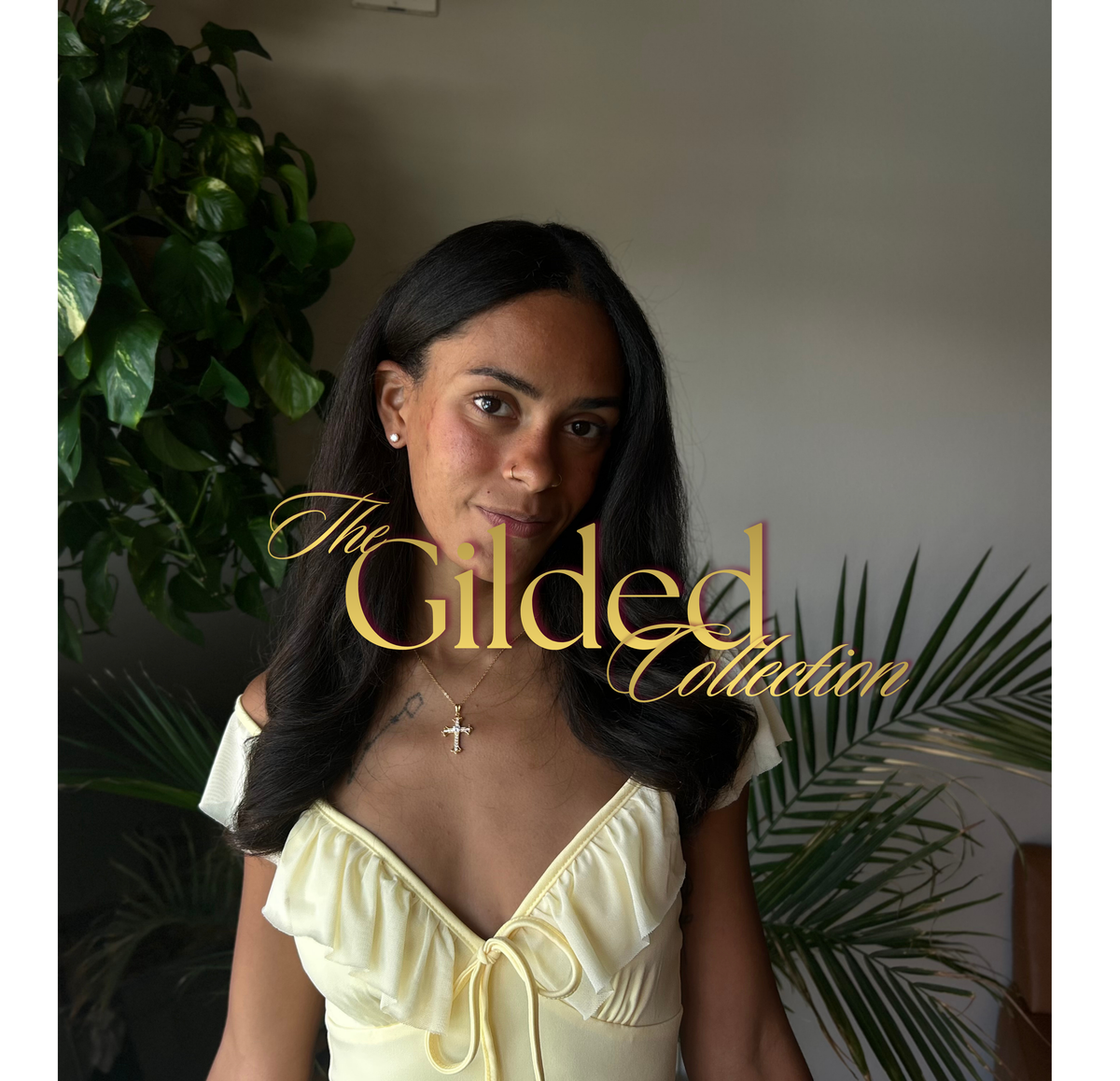 Model in yellow dress with the Overlay text saying 'The Gilded Collection'
