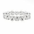 A silver diamond eternity band ring featuring marquise-cut and round diamonds set in a polished silver-tone metal, shown against a plain white background.