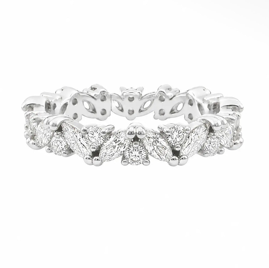 A silver diamond eternity band ring featuring marquise-cut and round diamonds set in a polished silver-tone metal, shown against a plain white background.