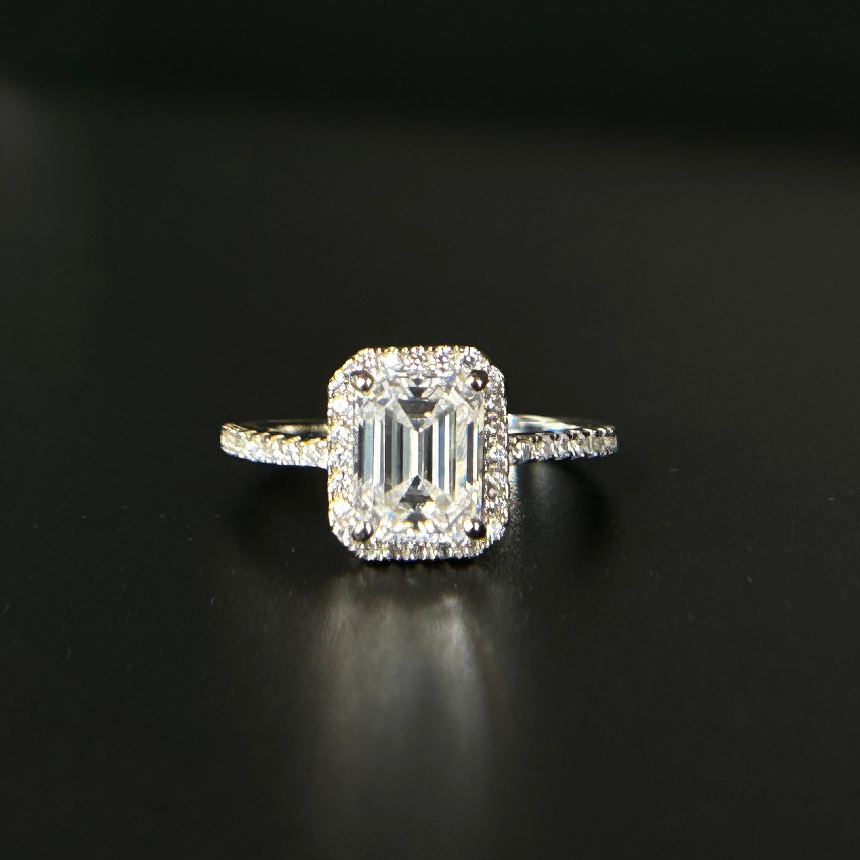 Moissanite Diamond ring with a black background